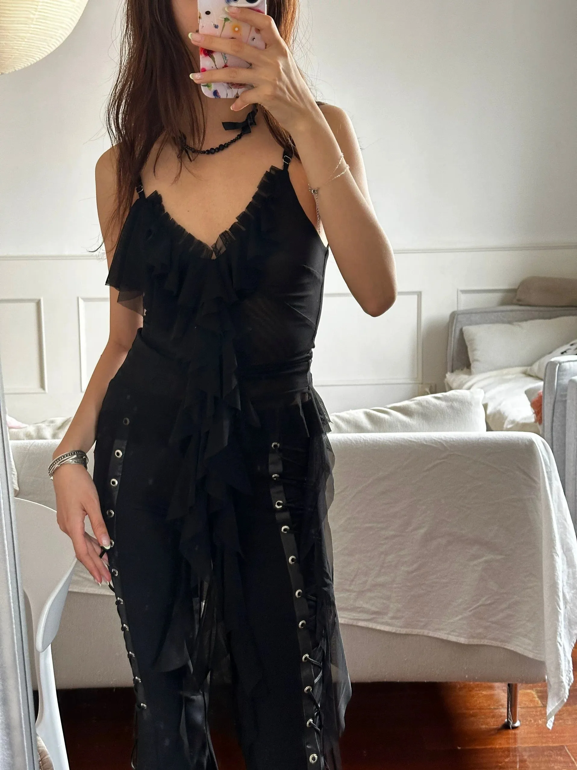 Black flowing mesh ruffle top