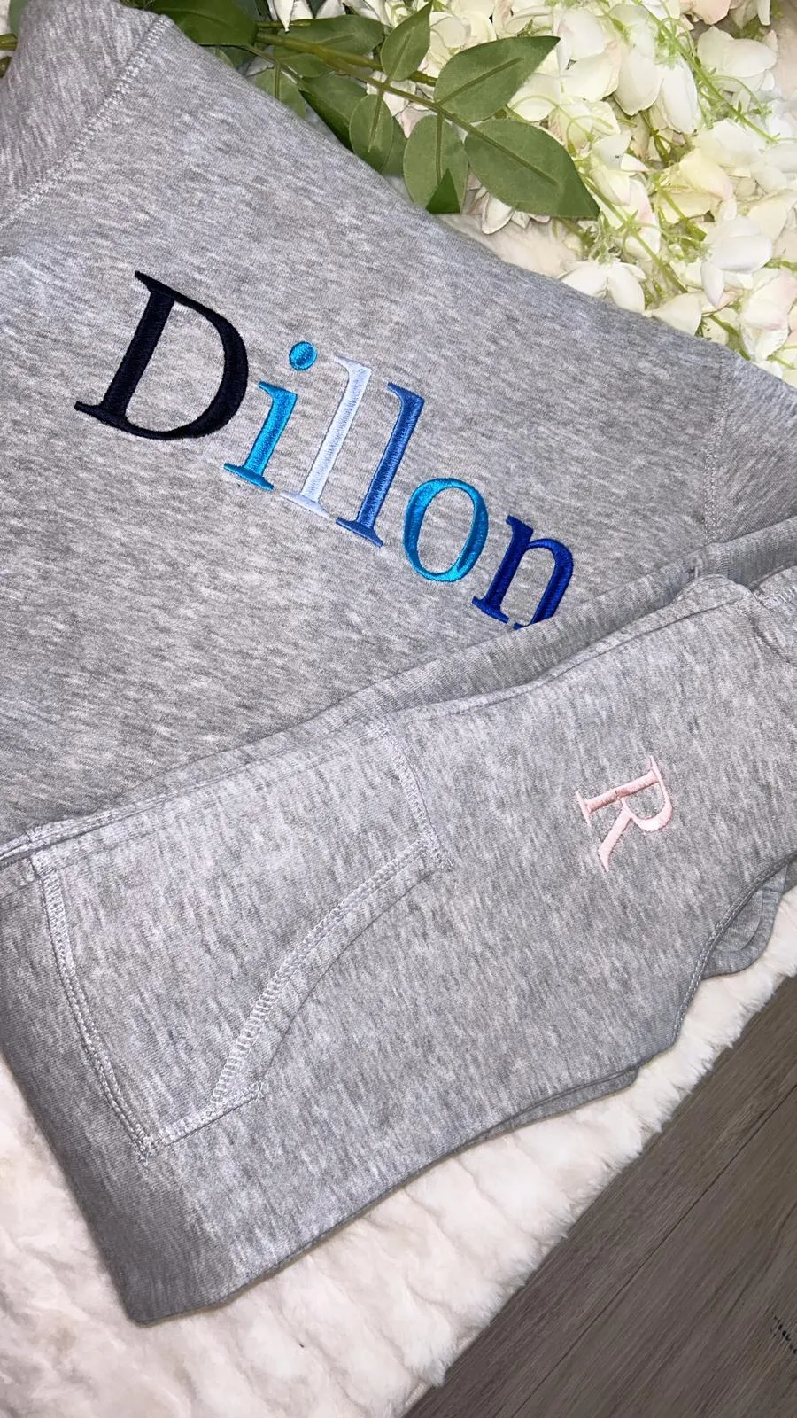 Grey hoodie style onesie